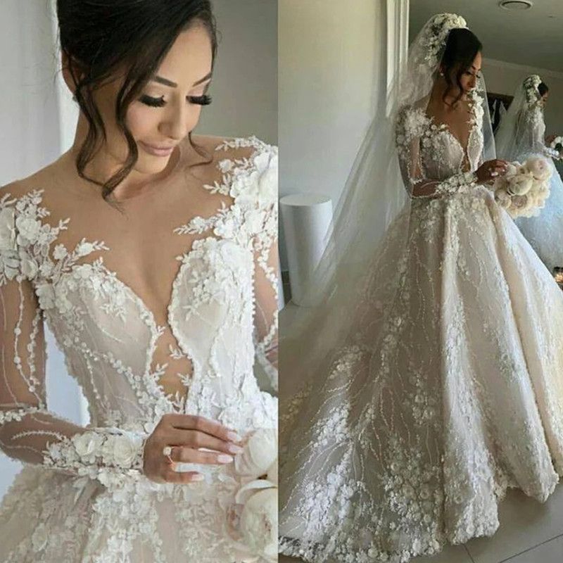 Ball Gown Wedding Dress with Sleeves: Elegant Beaded Illusion Long Sleeve Open Back Bridal Gown