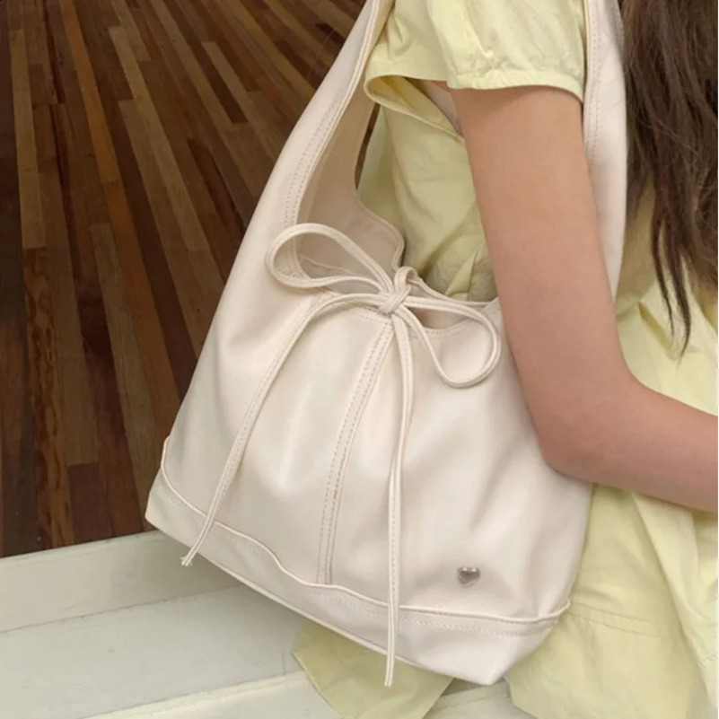 Fashionable sweet simple handbag womens elegant solid color series bow shoulder bag portable large capacity commuting bag 240907