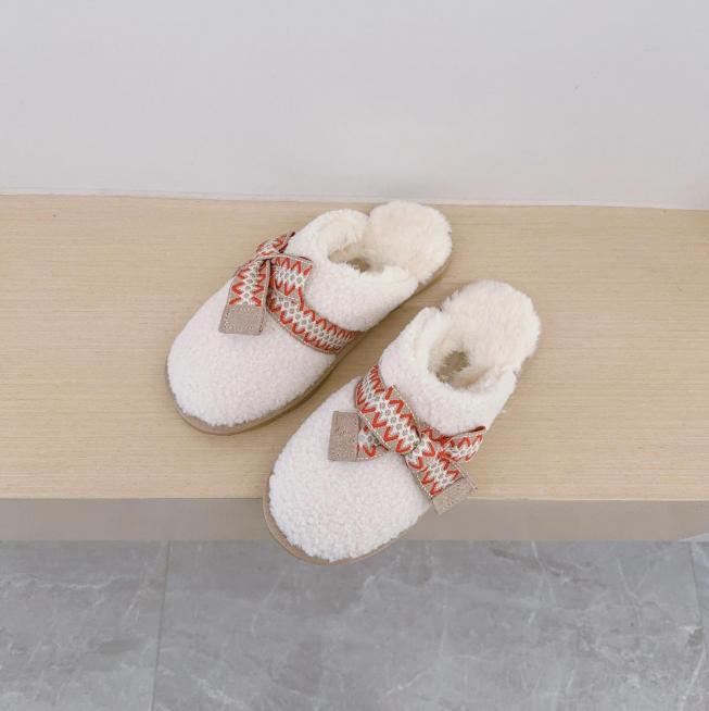 Boots de créateurs Femmes classiques en peluche bouclée en peluche boucles de pantoufles en peluche Nouvelles bottes de neige en cuir de cuir de