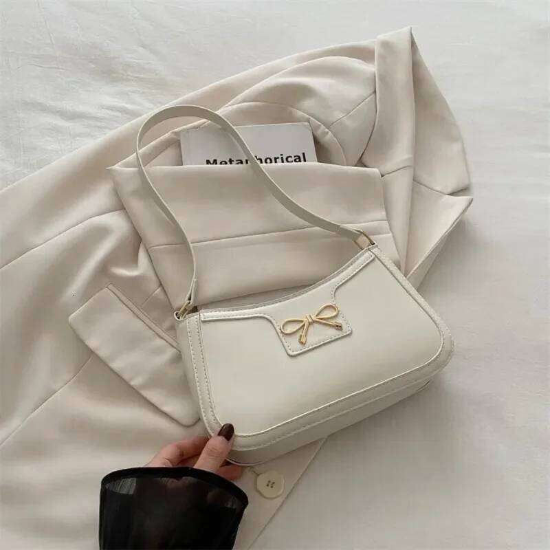 Tempérament de couleur solide des femmes Aaisset aisse simple Send de banlieue Bow Bow Bow Sac pour femmes