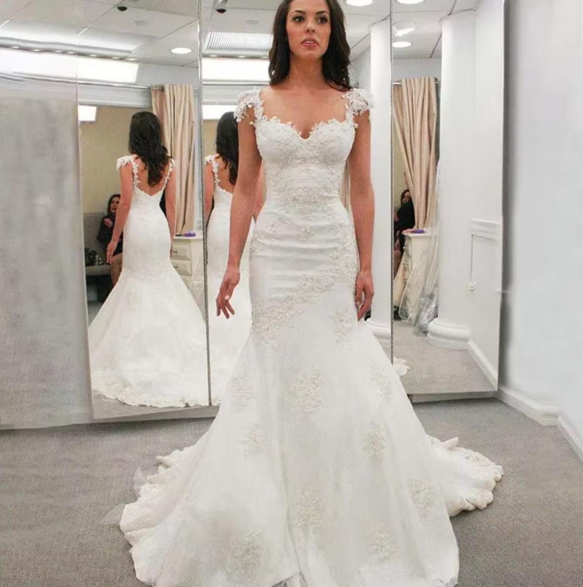 Spaghetti Straps Sweetheart Tulle Mermaid Wedding Dresses with spaghetti straps backless Fashion Appliques Bride Dresses African Wedding Gowns Boho