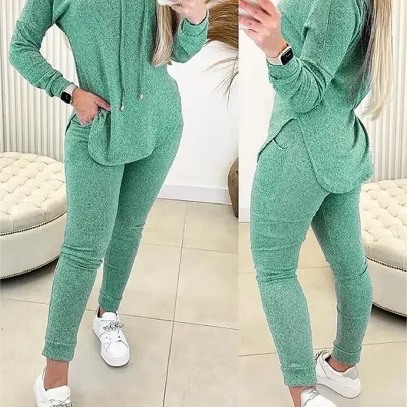 Set di abiti da donna a 2 pezzi per la primavera con una felpa con cappuccio a maniche lunghe di orlo alla moda e pantaloni a vita alta tasca casual
