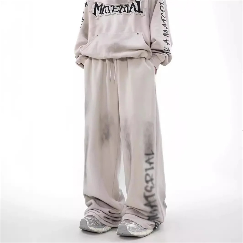 American style retro casual pants mens spring and autumn style dirty denim pants loose fit suitable for sports version 240911bj