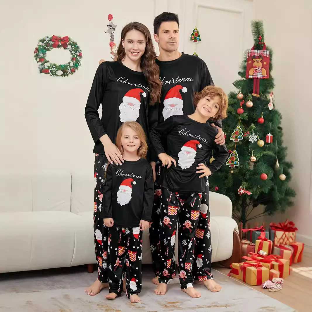 2025 New Christmas parentchild pajamas European and American longsleeved black set Santa Claus reindeer print home wear X250923