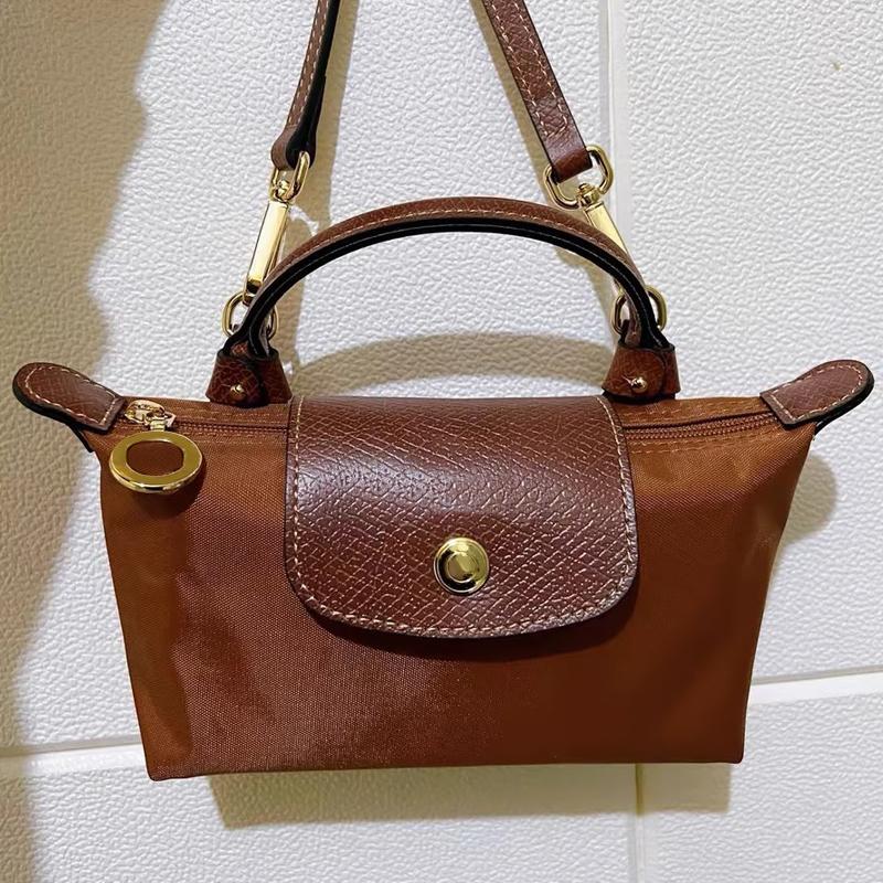 2025 Sac à bandoulière de créateur de livraison gratuite Girl de sac à main décontracté petite lettre de fourre-tout