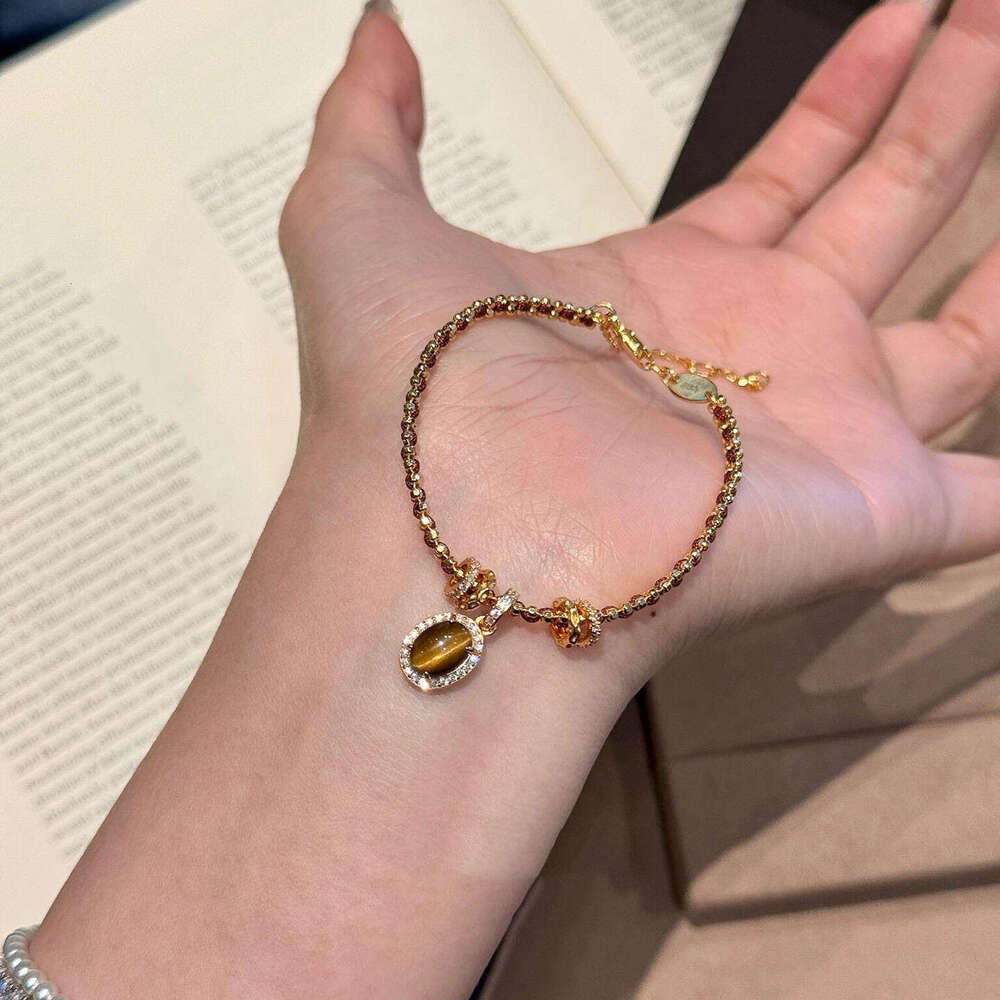 Autumn Winter Melard Oval Imitation Tiger Eye Stone Pendant Gold Running Ring Niche Design Sense Elegant Bracelet for Women