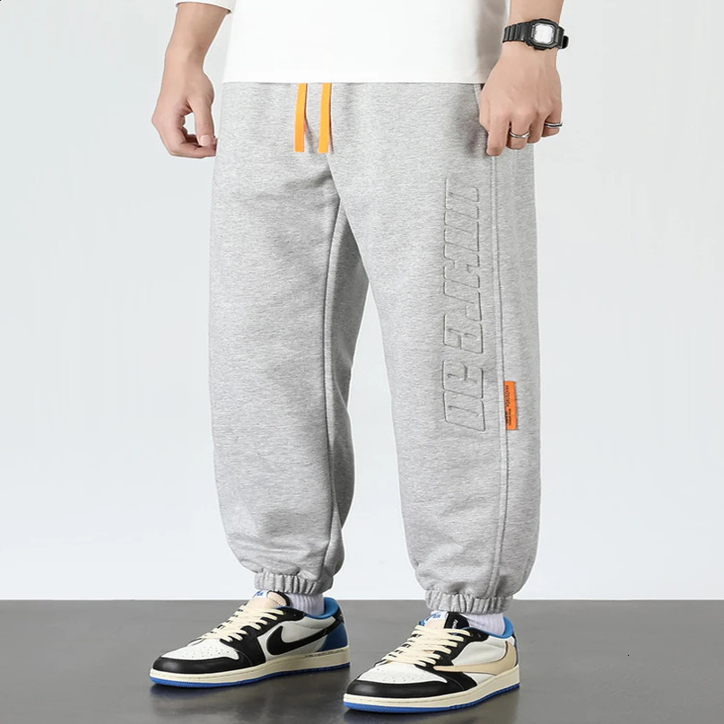Spring and autumn mens sports pants loose cotton casual harem 8XL 240816