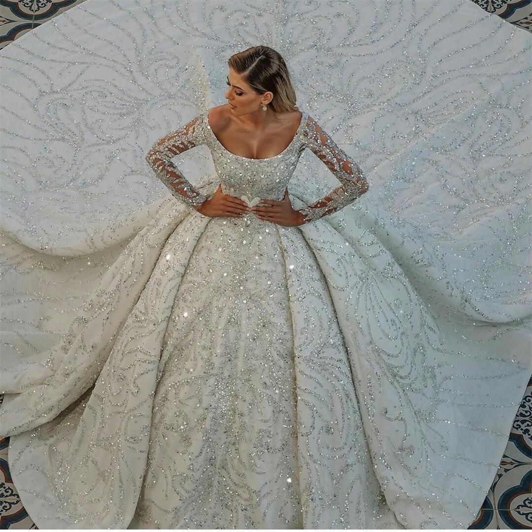 Elegant Train Wedding Dresses: Scoop Neck, Long Sleeve, Sequined Bridal Gown - Vintage Inspired, Perfect for a Sophisticated Celebration