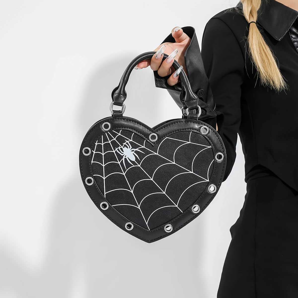 Fashion spider web print heart shaped crossbody bag punk style womens handbag simple and fashionable shoulder bag Z250925