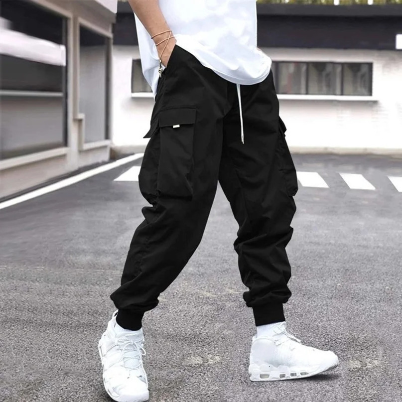 Mens fashionable casual cargo pants with flip pockets and side pull waist 240822