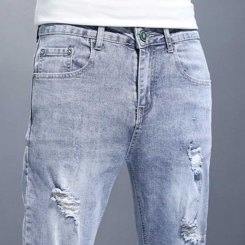 Mens Personalized Fashion Ripped Jeans Straight Slim Solid Color Spring Summer Denim Trousers HighQuality Brand Blue Jeans W250925