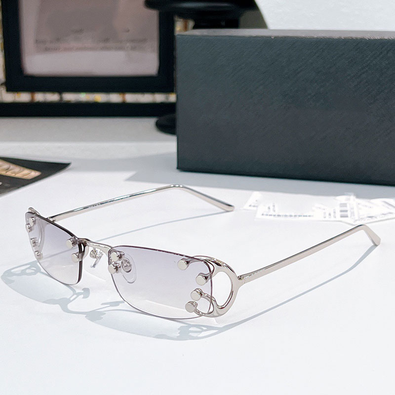 Runway Sunglasses Rectangular frame rimless lenses Unique metal details Designer Fall Winter Show with dedicated packaging SPRC57