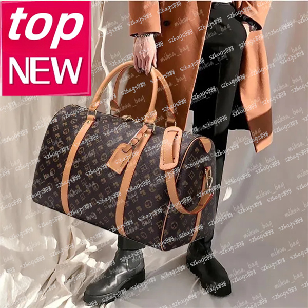 Sac de créateur mode Sac bouillère Men de voyage féminin Sac à main en cuir en cuir de grande capacité