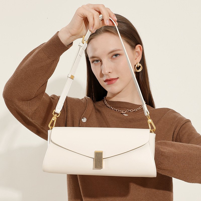 Advanced Niche Genuine Leather Women's Simple Shoulder Bag Free Shipping Designer New Trendy Commuting Armpit Bag Fashiona Versatile Luxury Han