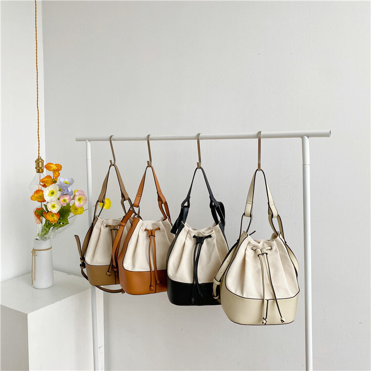 Free Shipping Designer Luxury Korean Style Hand-held Canvas Bag Niche PU Decal Shoulder Crossbody Bag Fashion Drawstring Casual Shopping Bag