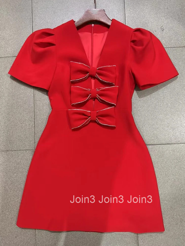 Fashion luxury spring and summer womens new V-neck rhinestone bow dress ladies high waist short sleeve temperament mini skirt.