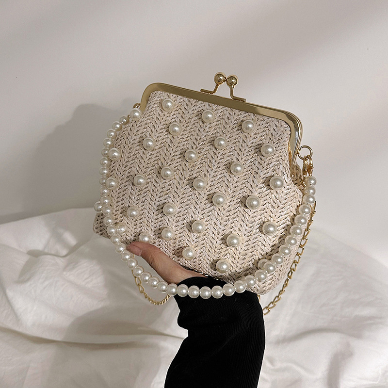 Luxury Brand Designer Bag Pearl Handheld Clip Bag 2023 Spring New Woven Bag Chain Shoulder Straw Bag Crossbody Beach Women's Bag