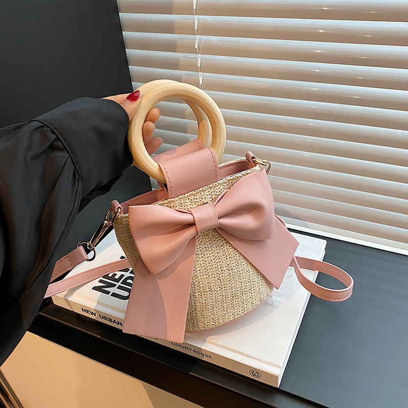 Luxury Brand Designer Bag 2025 Summer New Bowknot Fresh Style Wooden Handle Straw Bag Thailand Travel Vacation Bucket Bag Wholesale