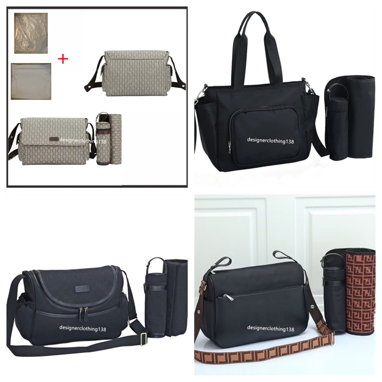 Designer diaper bag foreign trade explosive brown mommy bag high-end fashion mother and baby seat cushion bottle baby diaper bag three-piece set