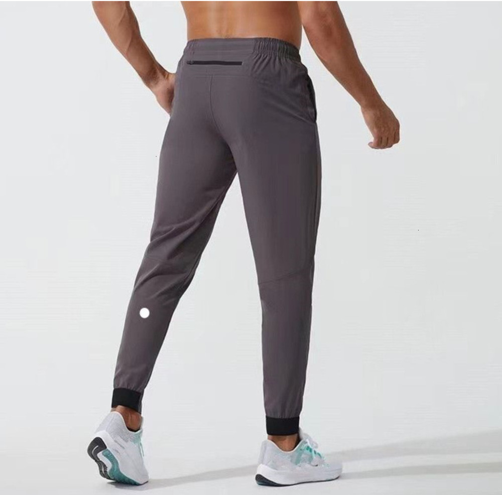 2025 Men Pants Yoga Outfit Sport Quick Dry Drawstring Gym Pockets Sweatpants Trousers Mens Casual Elastic Waist designer Fashion aritzia pmrx
