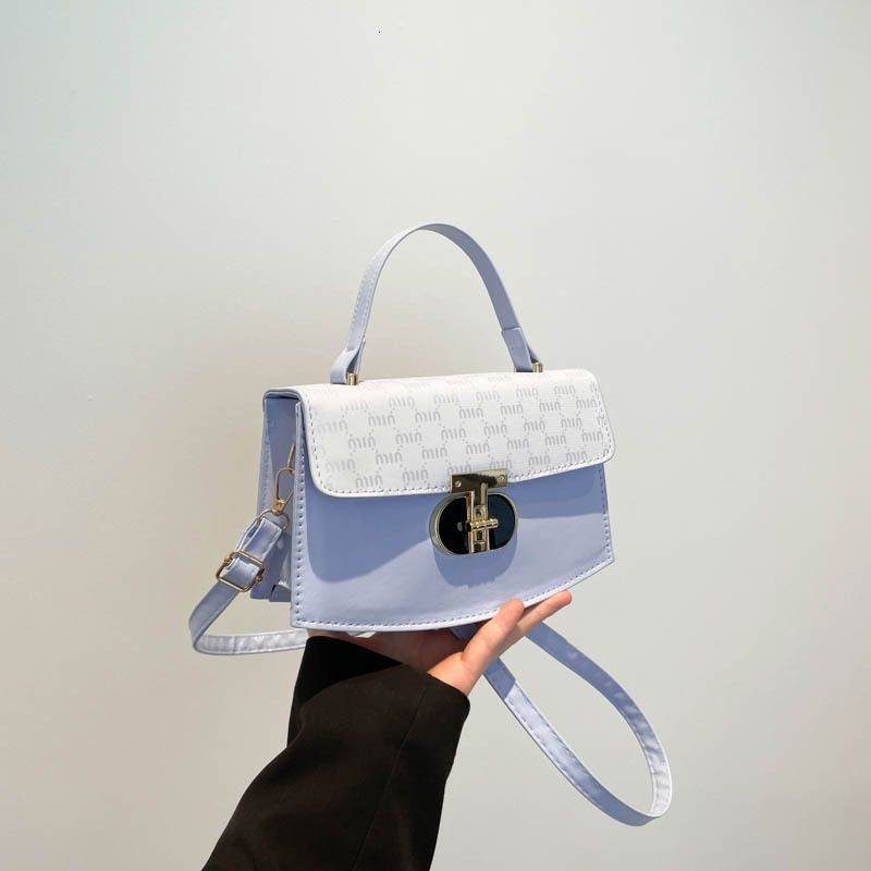 Boucle de verrouillage minimaliste 2025 Tendy élégant design de mode Bloc de couleur Texture Crossbodybody Sac à main Small carré Sac pour les fe