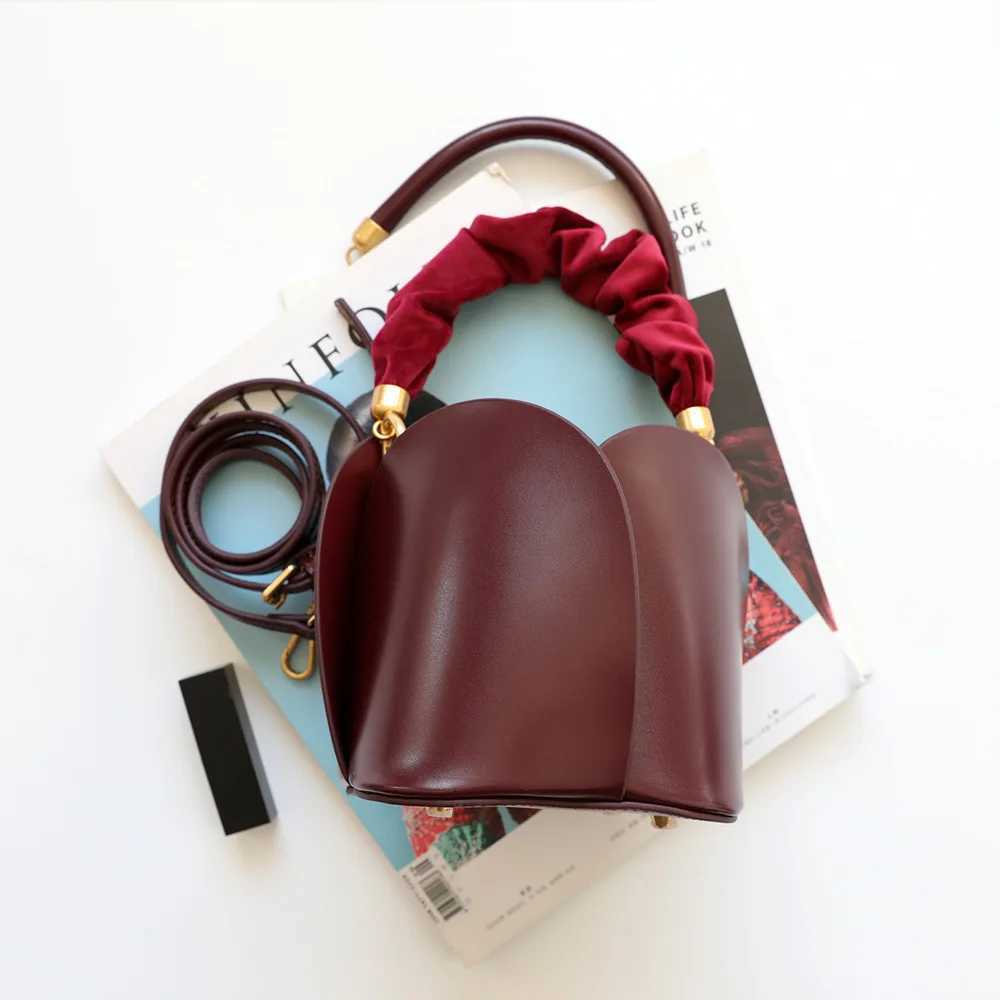 2023 Sac de godet Ubellin Mini pour femmes Solies en cuir authentique Sacs de corps crossboda