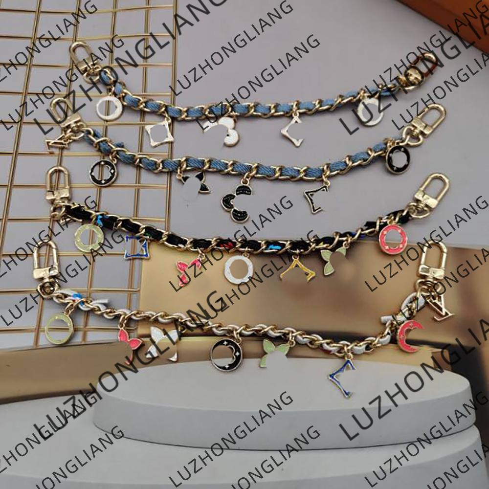 Village on Cherry Blossom Bag Charm Designer Keychain Wallet Designer Key Ring Metal Luxury Key Holder for Women Handbag Letter Flower Pendant Decor