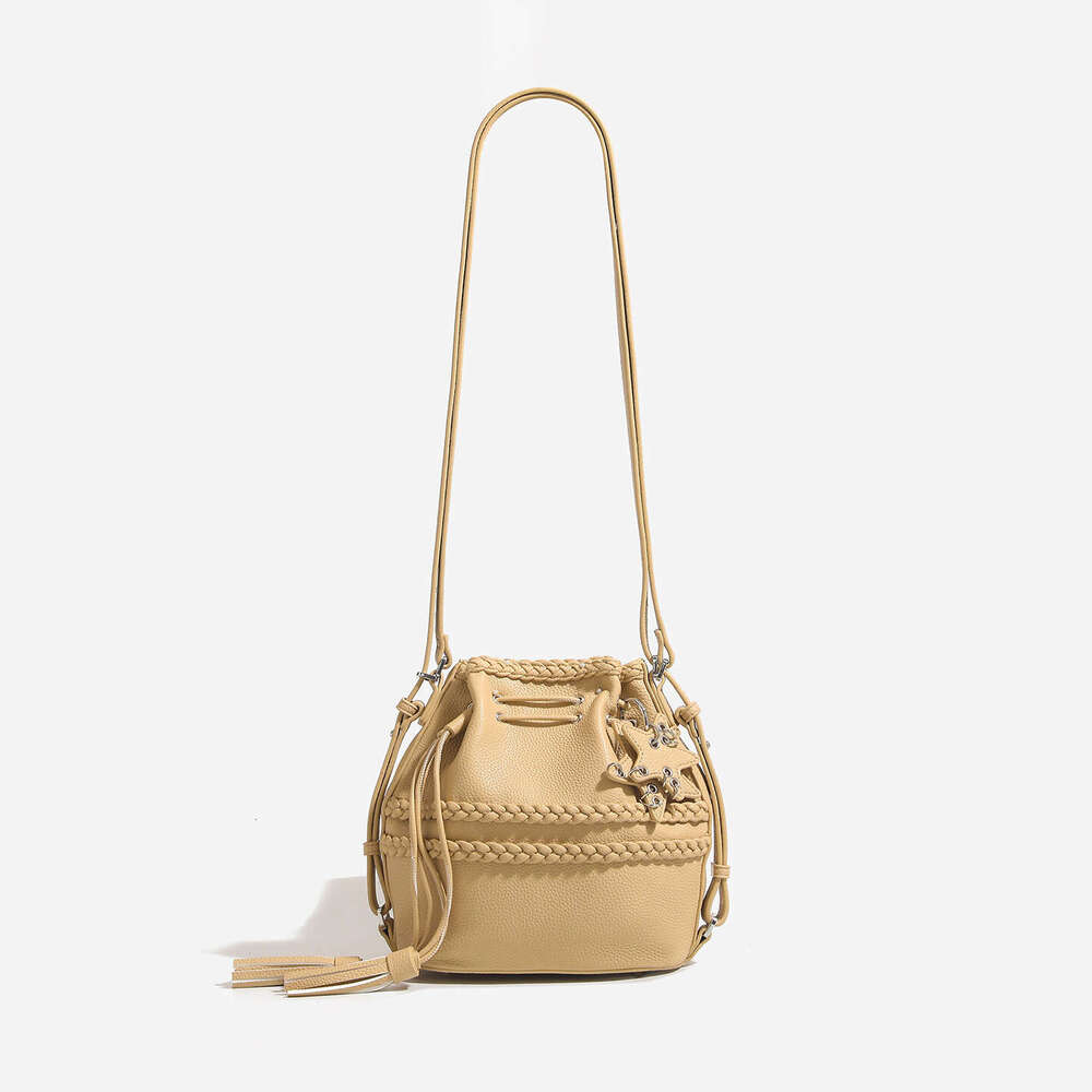 Women's Shoulder Bucket Bag 2025 New Designer Fashionable Tassel Drawstring Cross Shoulder Commuter Backpack