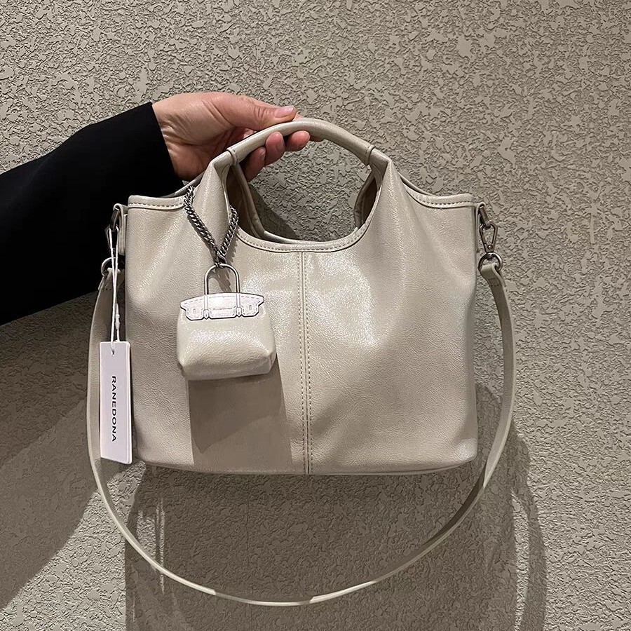 Women's New Large Capacity Casual Handbag Cowhide Pattern Single Shoulder Crossbody Bucket Bag