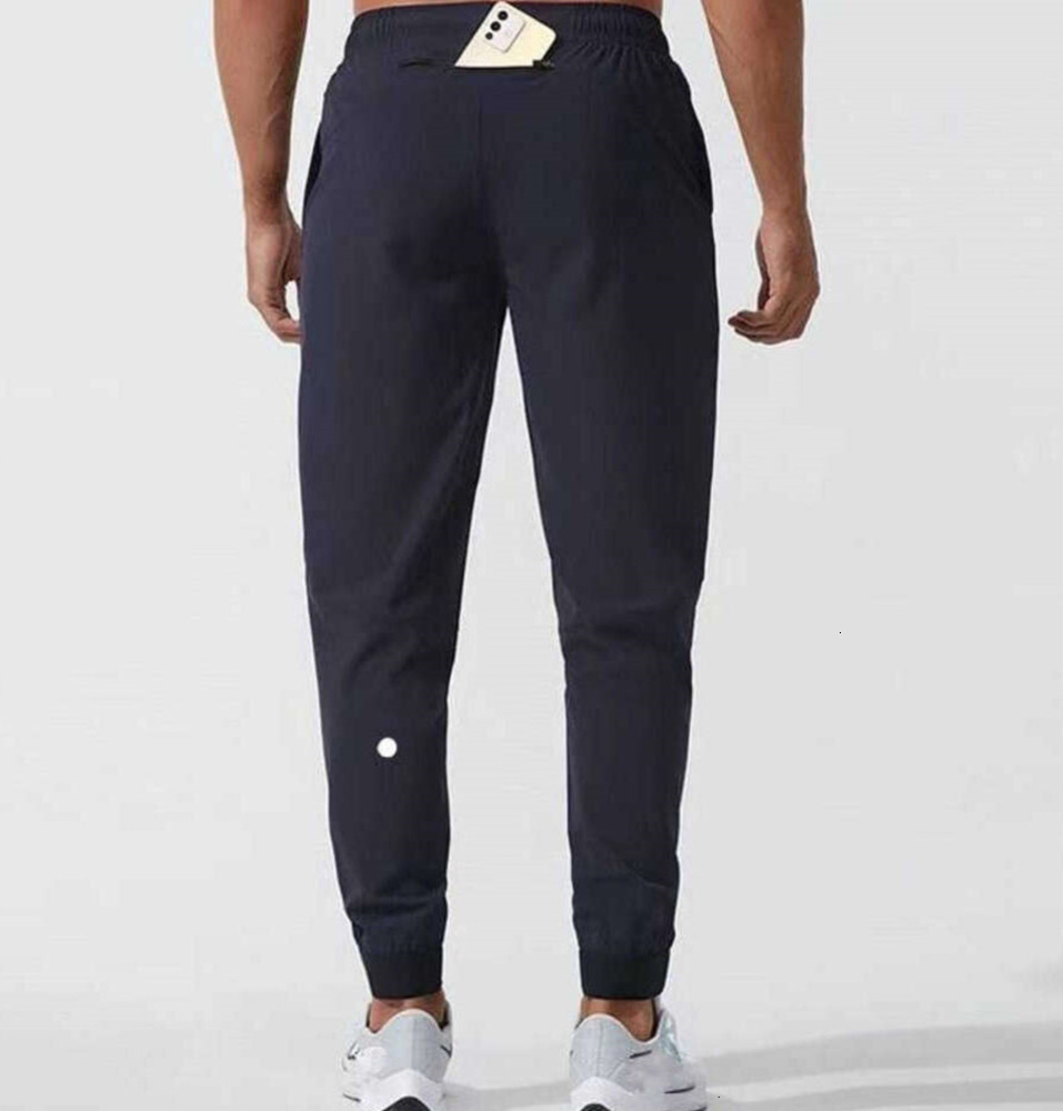 2025 Men Pants Yoga Outfit Sport Quick Dry Drawstring Gym Pockets Sweatpants Trousers Mens Casual Elastic Waist designer Fashion aritzia pmxz