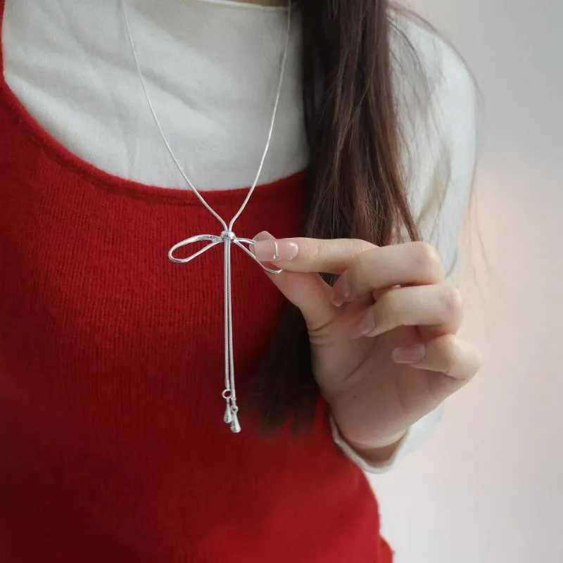 2025 Collier d'arc de la mode pour les femmes filles coréen bowknot en métal argent cordon de cordon à longue chaîne de bijoux accessoires cadeau