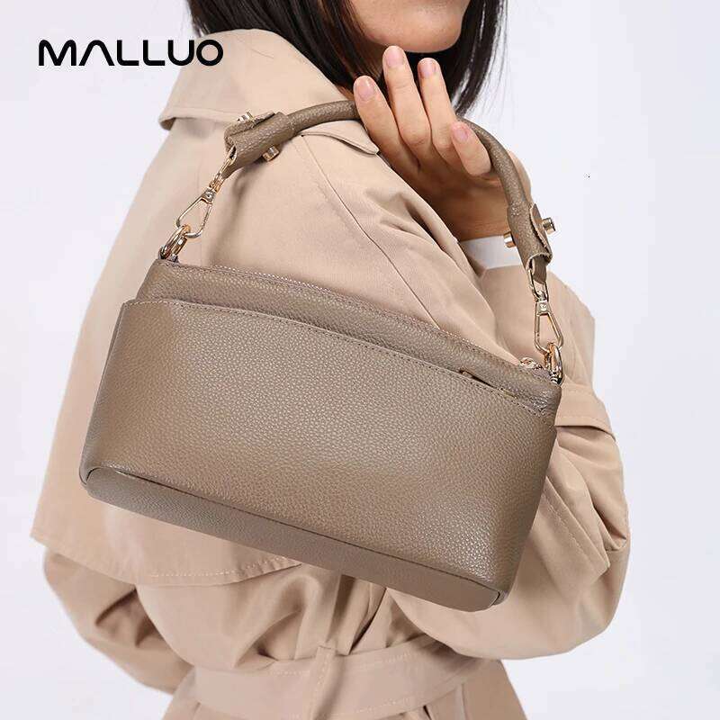Sacs de créateurs Femmes Cow Hide Véritable sac d'épaule pour dames Designer Fashion Retro Sacs femelle vache en cuir réel sac à main pour lady