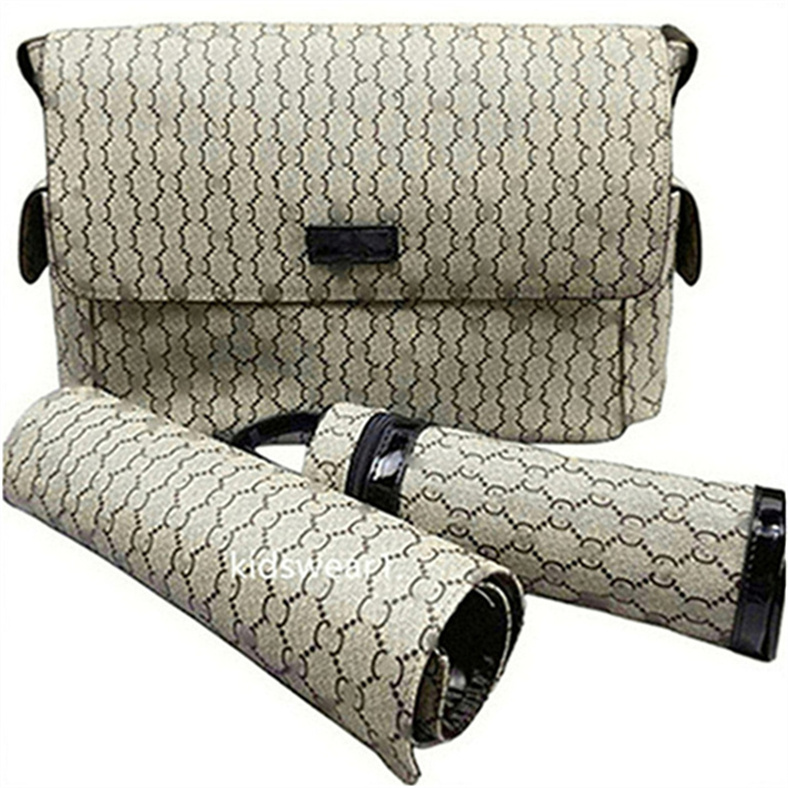 Sacs à couches Mummy Baby Sac à dos avec station de changement de pliage Station de maman portable Sang de poussette pour les couches de sac à ma