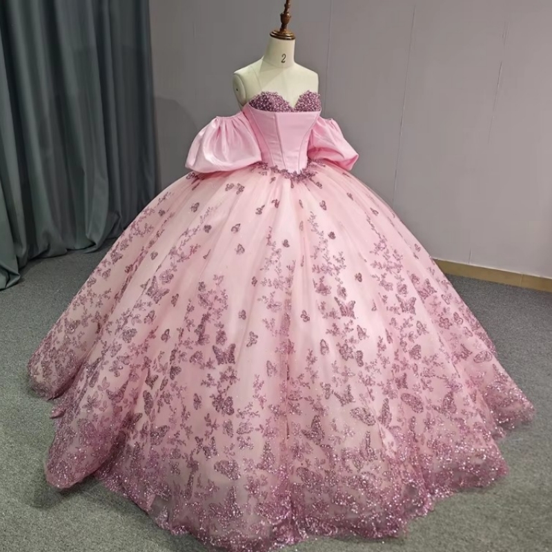 Robes de quinceanera brillantes robes de bal à épaule à épaule Applique Bow perle Tull Tull Sweet 16 Viens de robe de 15 anos