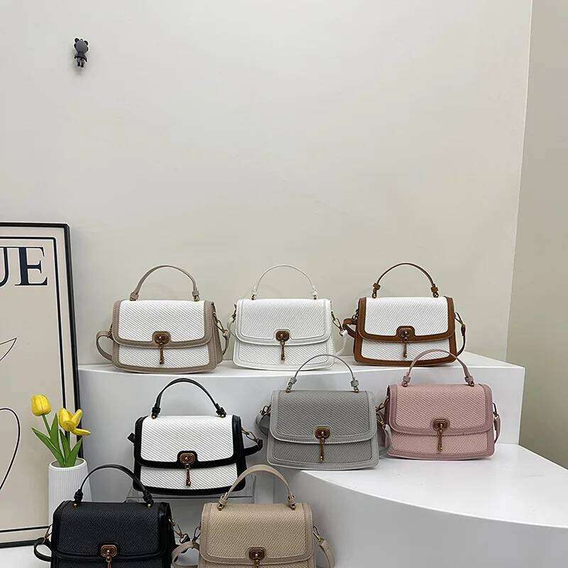 Luxury designer niche high-end women's clothing new color matching splicing small square bag simple shoulder messenger bag