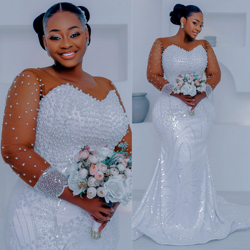 2025 Plus Size White African Wedding Dress Bridal Gowns For Bride Mermaid Wedding Gowns Sheer Neck Long Sleeves Beaded Tiered Luxurious Lace Pearls