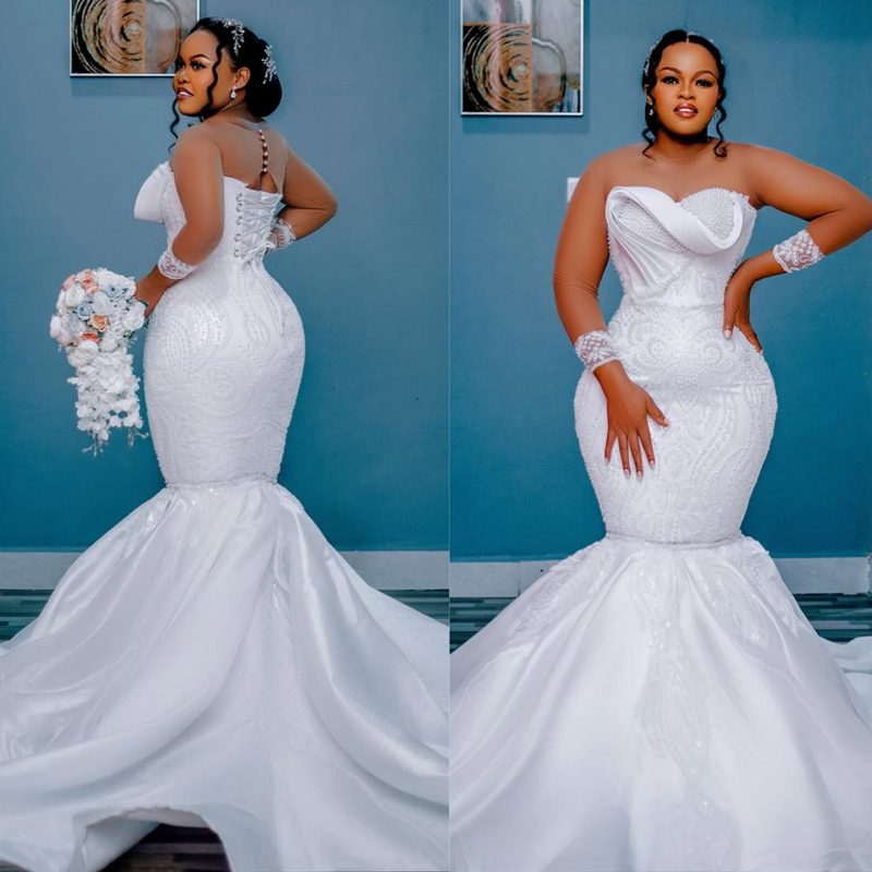 2025 Plus Size White African Wedding Dress Bridal Gowns For Bride Mermaid Wedding Gowns Sheer Neck Long Sleeves Beaded Tiered Luxurious Lace Pearls
