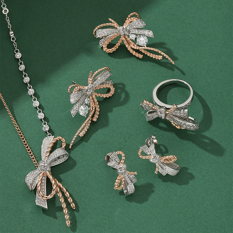 Boucles d'oreilles de style collection de concepteur Collier Bracelet Femme Dame Inclay Ensembles de bijoux de bijoux en deux couleurs