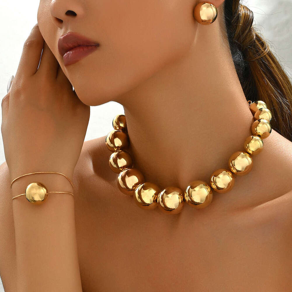 Fashion Ol Style de banlieue Bracelet Géométrique Collier Boucle d'oreille Niche Light Round Ball Design Bijoux