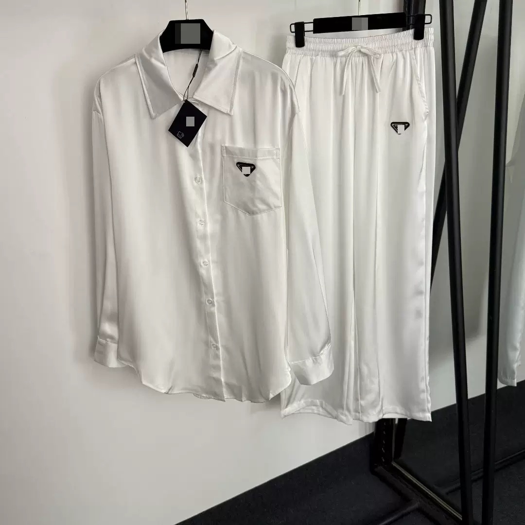 New unisex home style designer casual set: Triangular label pocket designer long-sleeved shirt + elastic high-waisted wide-leg trousers