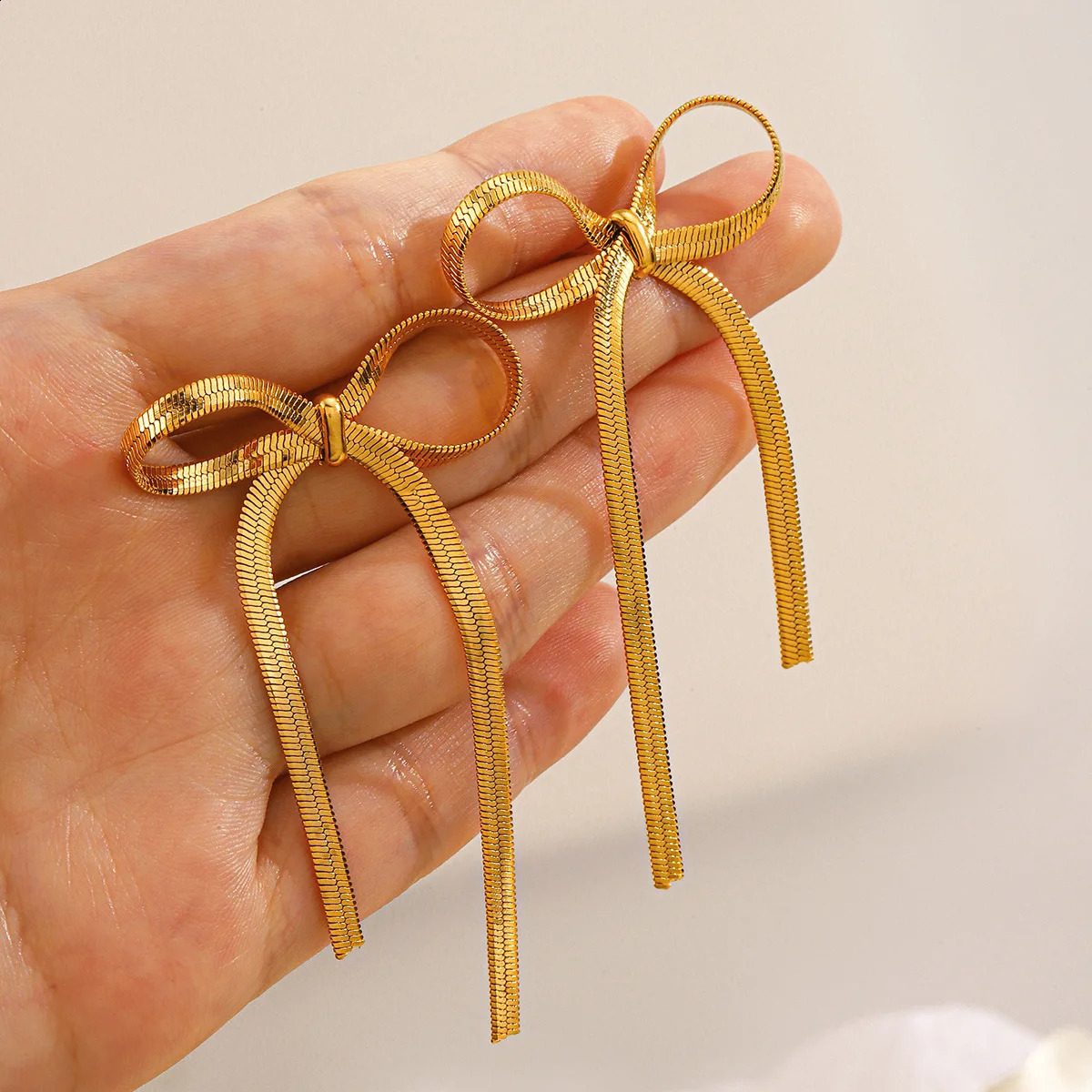 Fashion Gold Color stainless steel Flat Snake Chain Knot Bow Earrings for Women Girls Bowknot Long Tassel Earring Jewelry 250811