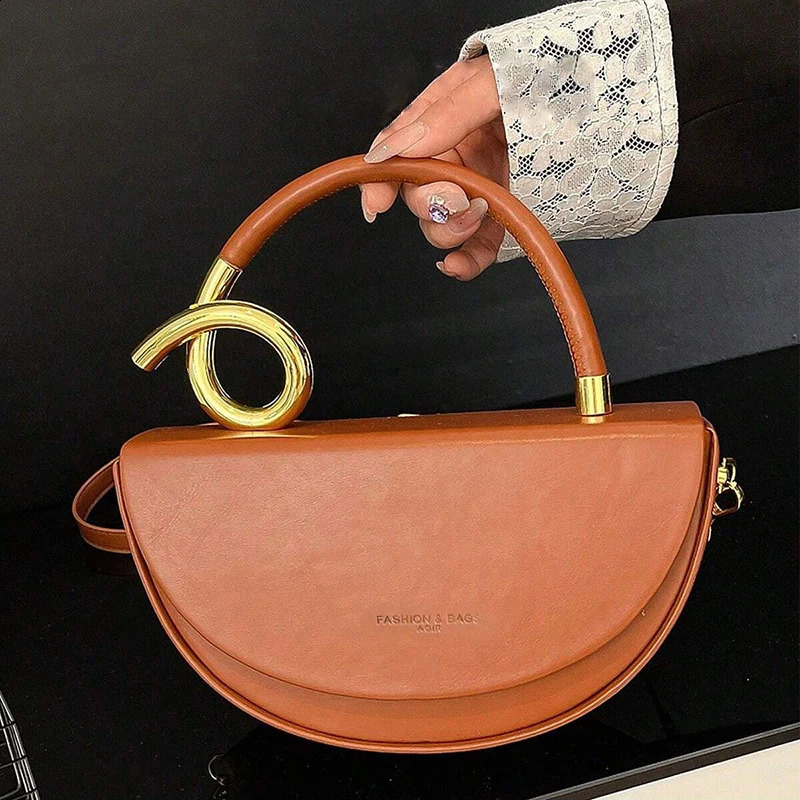 Niche n womens handbags fashionable retro messenger bags solid color versatile underarm saddle 250815