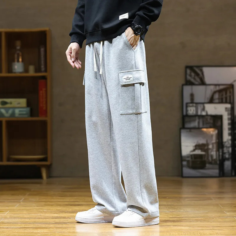 sports casual pants mens multi pocket drawstring casual pants suitable for urban streets mens loose straight leg pants 8XL 250818