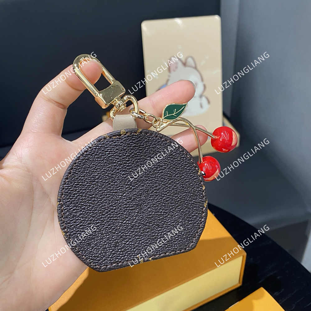 2025 fashion designer keychain small mirror cherry pendant keychain accessory clothing accessories+box