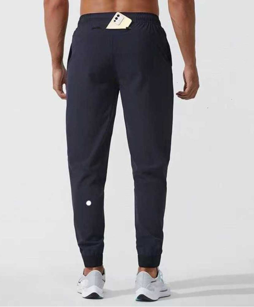 2025 Men Pants Yoga Outfit Sport Quick Dry Drawstring Gym Pockets Sweatpants Trousers Mens Casual Elastic Waist designer Fashion aritzia pphx