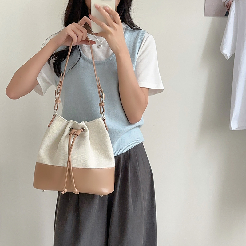 Korean Fashion Large Capacity Women's Canvas Bag Free Shipping Designer Splicing Drawstring Bucket Bag Versatile Casual Shoulder Crossbody Bag