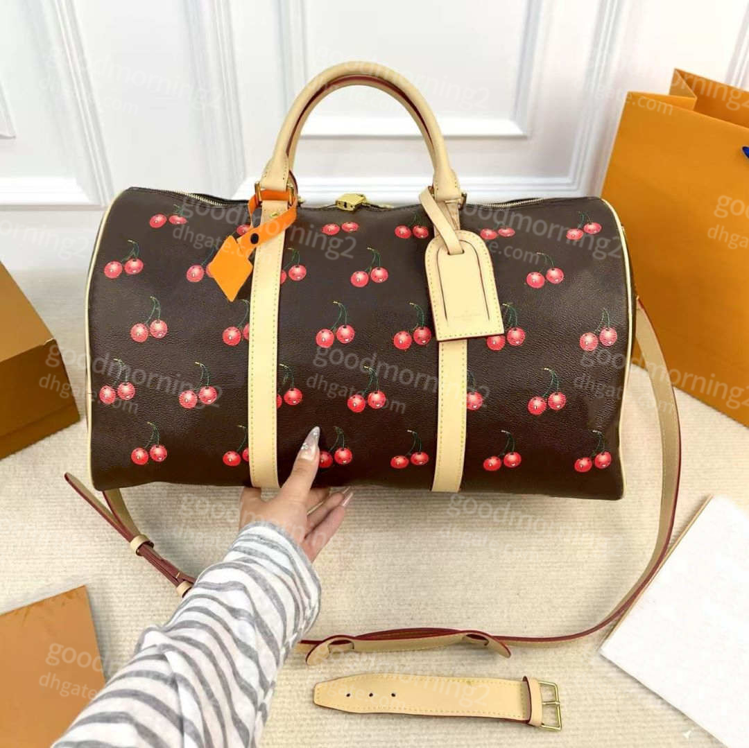 2025 Murakami Takashi Duffel Sac Cherry Blossom Modèle Femme Sac de voyage 45 cm Taille de banlieue de grande capacité 10a Top Quality Fabric Voy
