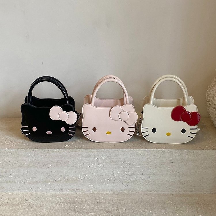 Version coréenne Ins Niche Design Sweet Kitty Livraison gratuite Designer de luxe Cat Single Single Crossbody Body Texture Texture Cartoon Cute B