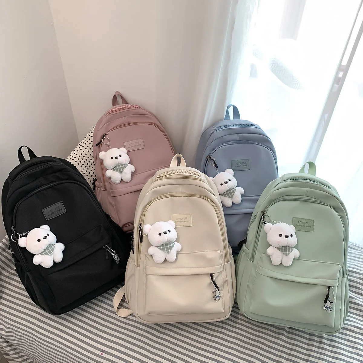 Femelles hommes de mode haute capacité imperméable collège sac à dos à la tendance des femmes ordinateur portable sacs d'école mignonne fille de