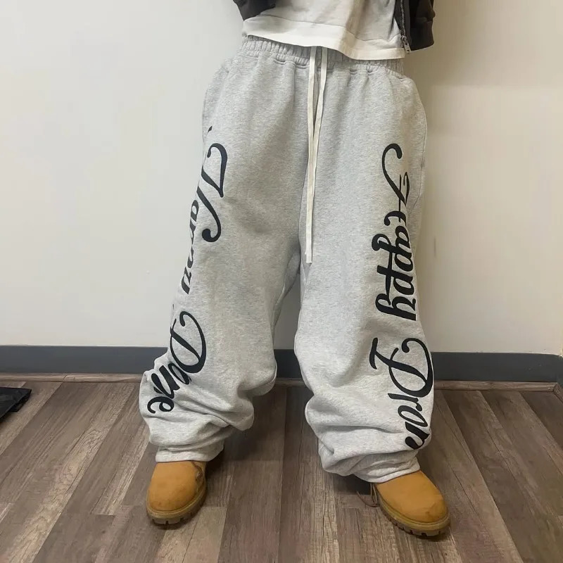 2025 Men de streetwear Pantalon de jambe droite imprimé pantalon de mode Hip Hop American Goth Harajuku rétro pantalon de survêtement en vrac Wom
